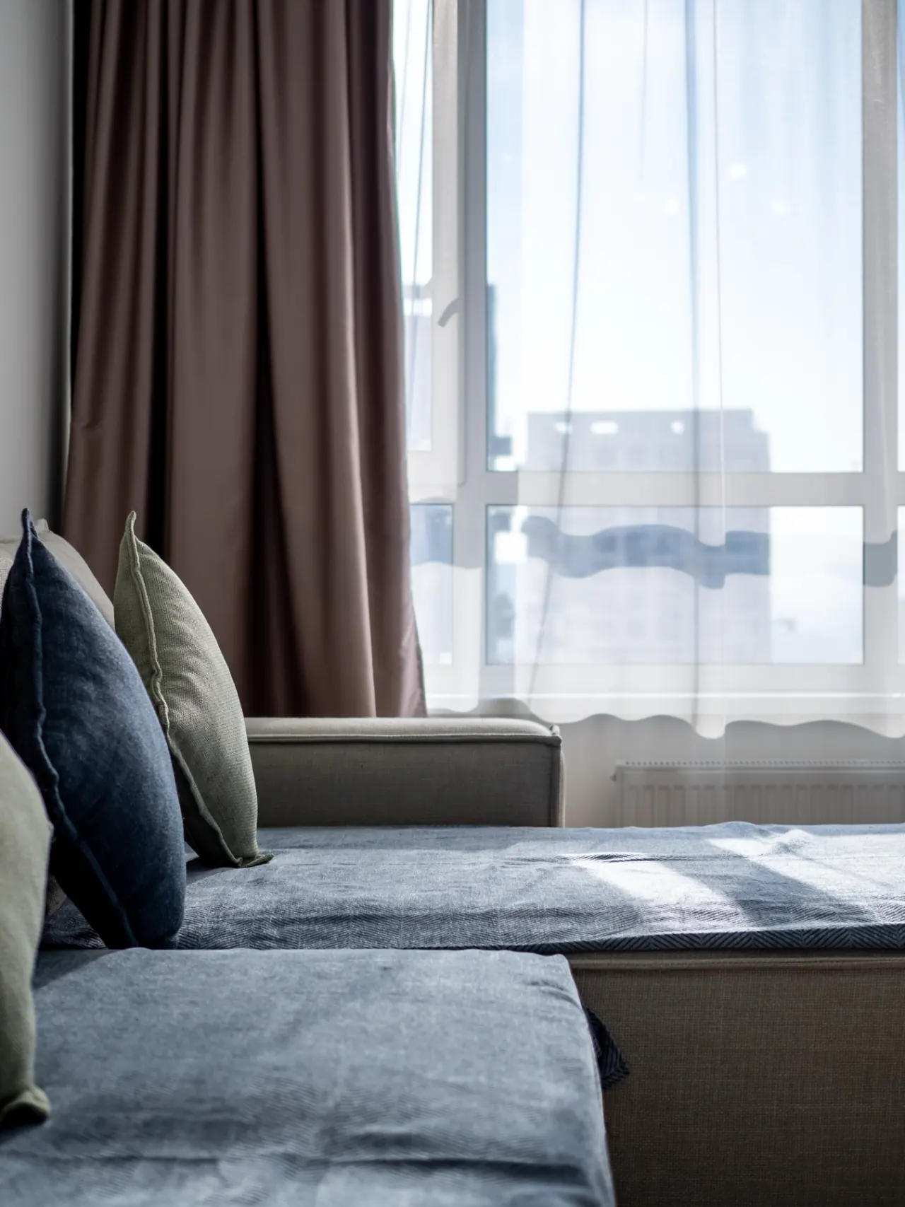 Lounge seating by the floor-to-ceiling window