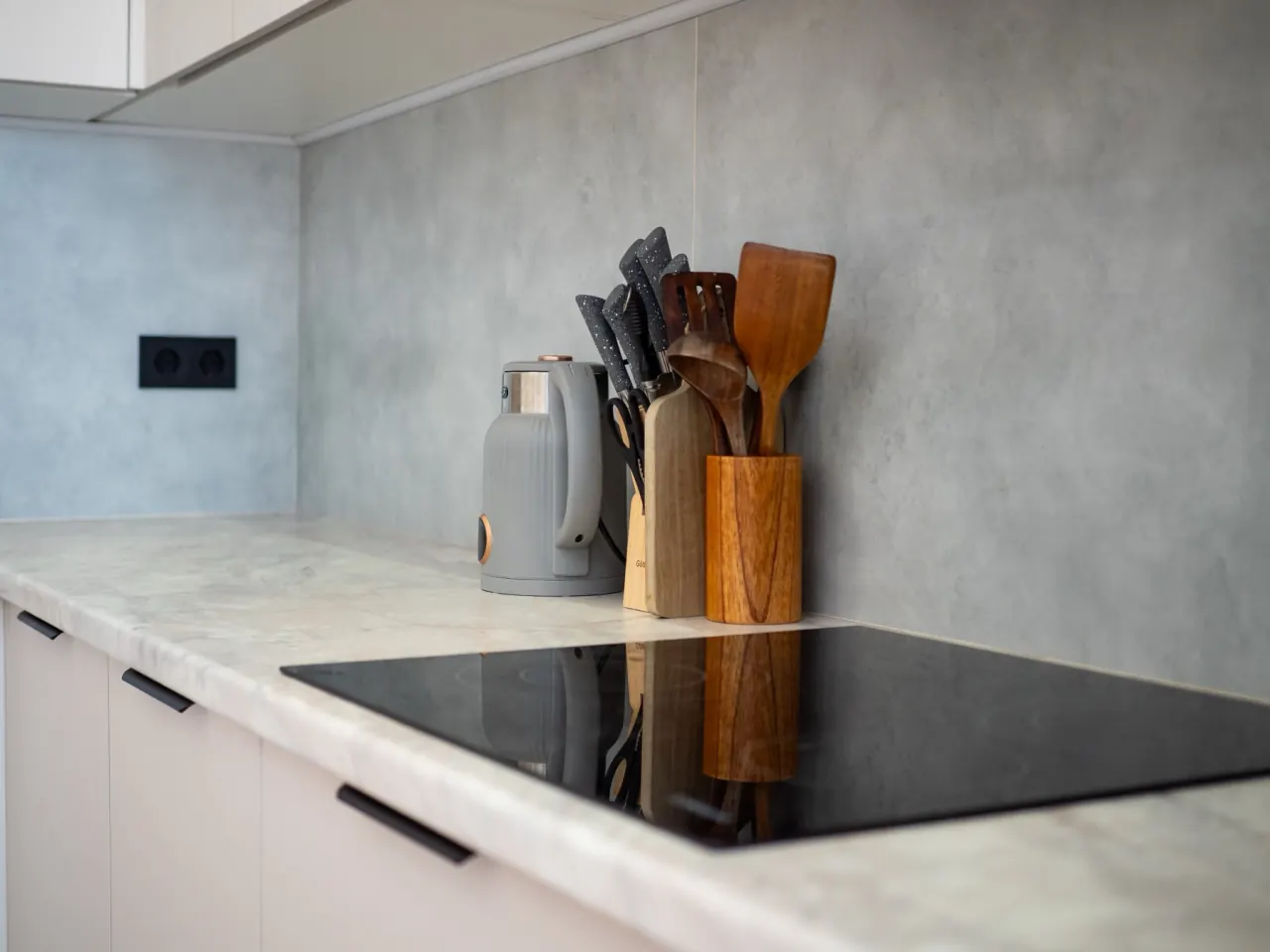 Stone kitchen counter with induction hob