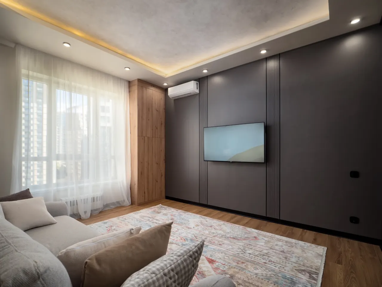 Living room with wall-mounted Smart TV
