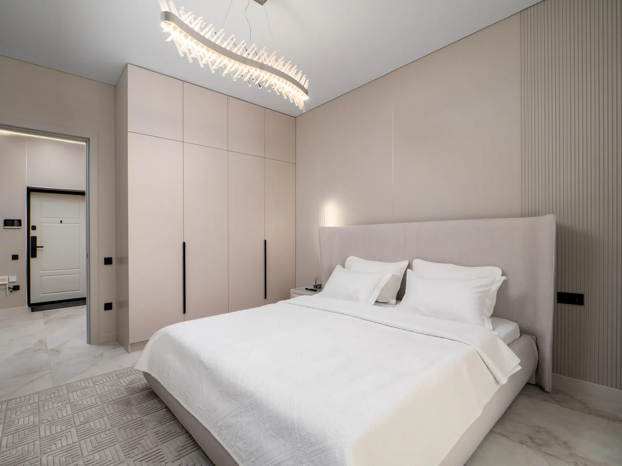 Bedroom with full-height fitted wardrobe